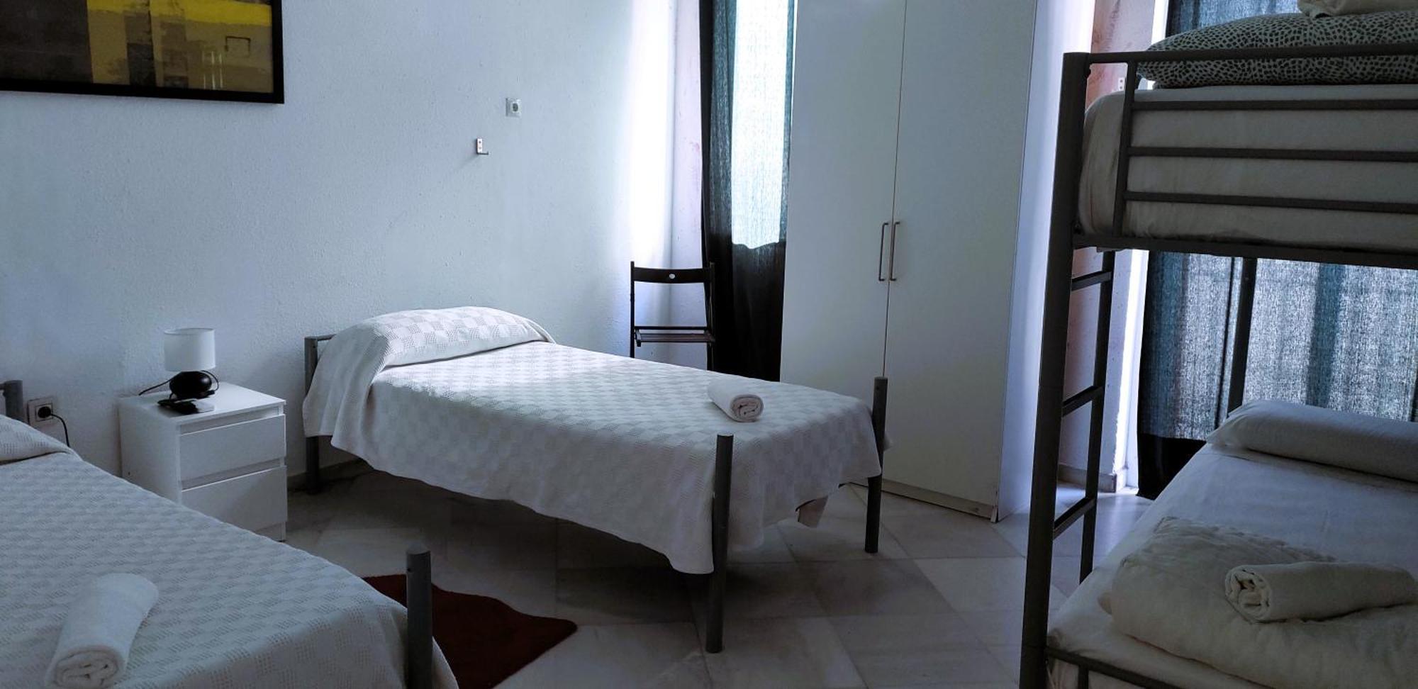 Quarto Quádruplo com Casa de Banho Privativa